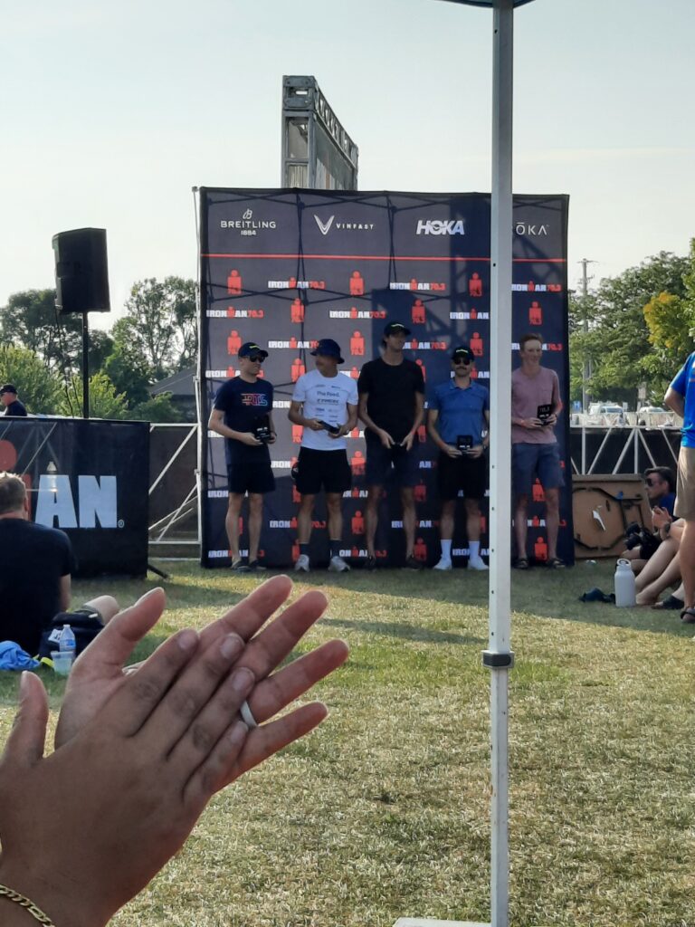 The pro men's podium at IRONMAN 70.3 Michigan